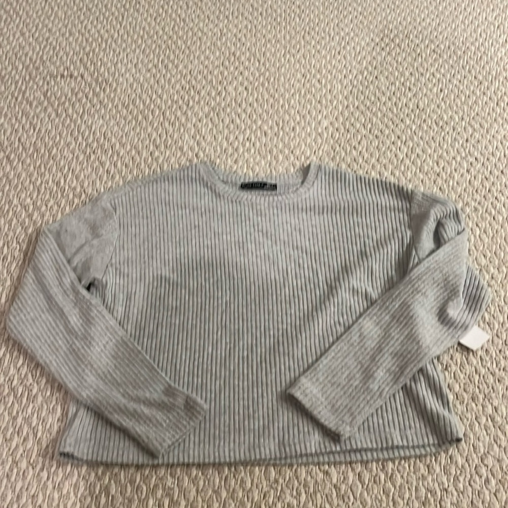 Black tape_ sweater